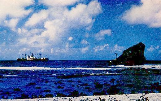 Wake Island with a big ship in the sea