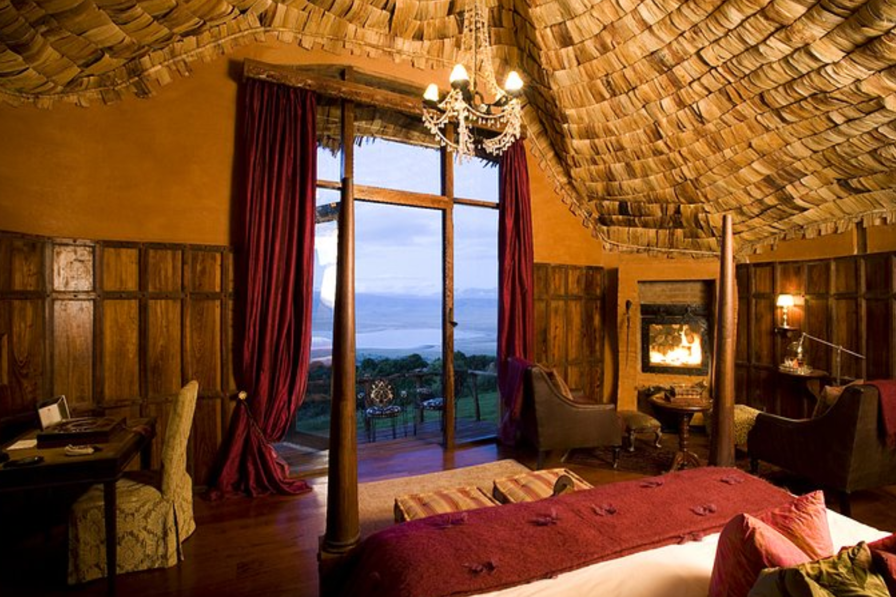 The interior of Ngorongoro Crater Lodge, complete with a bed