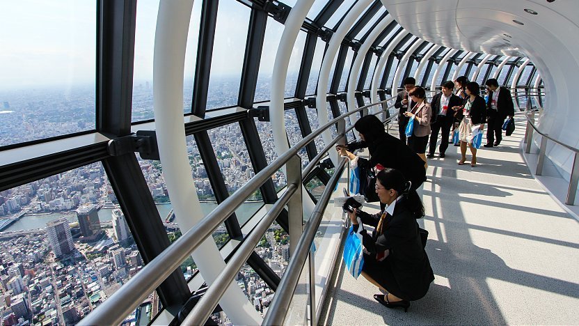 People taking a photo of the view in Tokyo Skytree