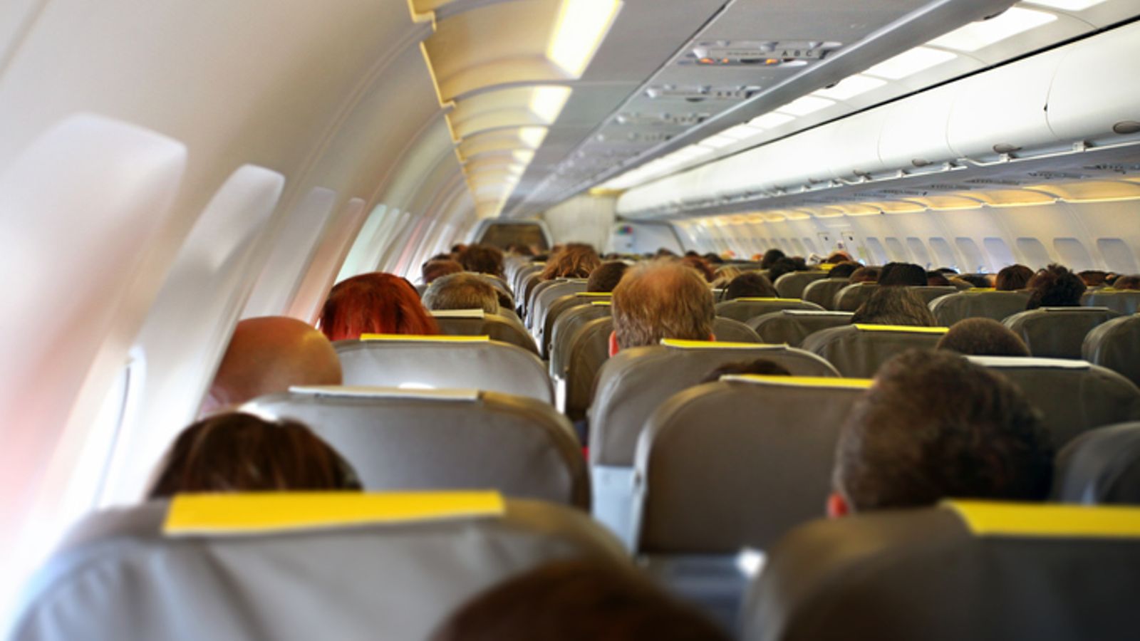 Expert Explains Why You Can't Get Off The Plane If Your Flight Is Delayed After Boarding